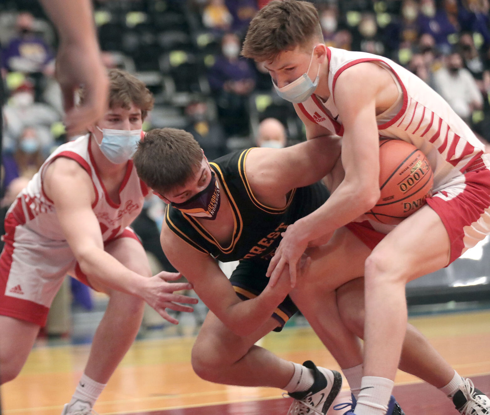 WIAA state boys basketball photo: DeForest's Trace Grundahl battles for possession